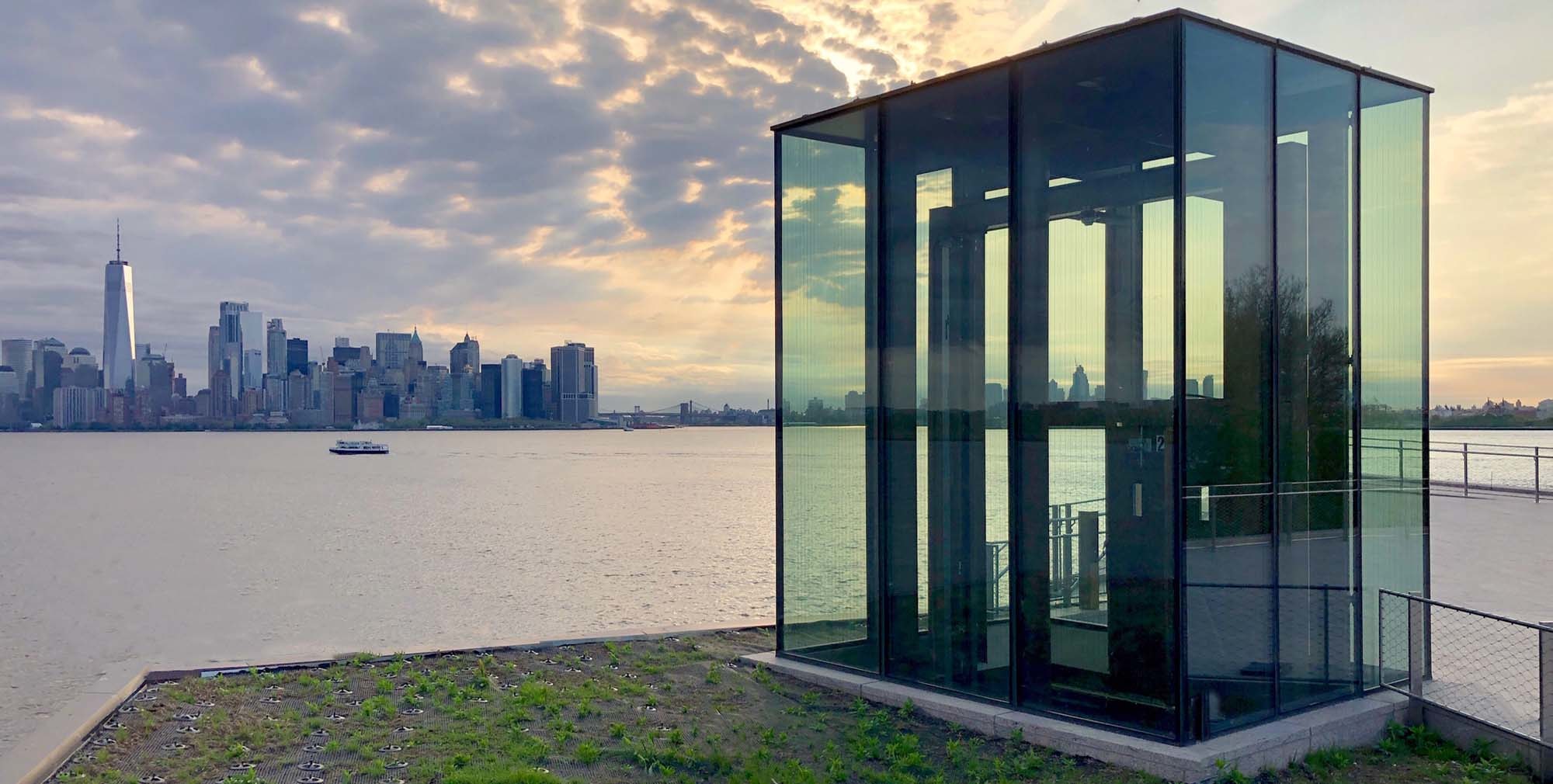 The Statue of Liberty Museum opening spring 2019 overlooks NY Harbor and the city skyline